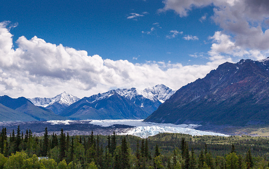 The Matanuska Glacier viewed from the Glenn Highway in the US state of Alaska. Matanuska Glacier, at 27 miles long by four miles wide, it is the largest glacier accessible by car in the United States. Its terminus feeds the Matanuska River.