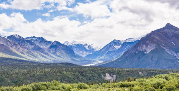 The commanding Chugach Mountains viewed from the Glenn Highway in the US state of Alaska. The Glenn Highway extends 179 miles from Anchorage near Merrill Field to Glennallen on the Richardson Highway.