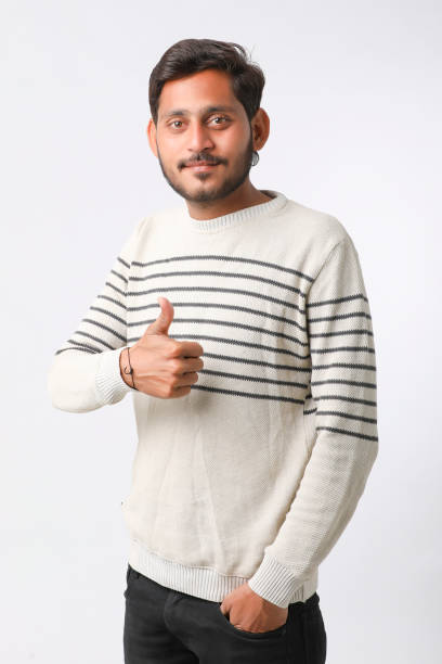 istock Young indian man giving expression on white background. 1388499938