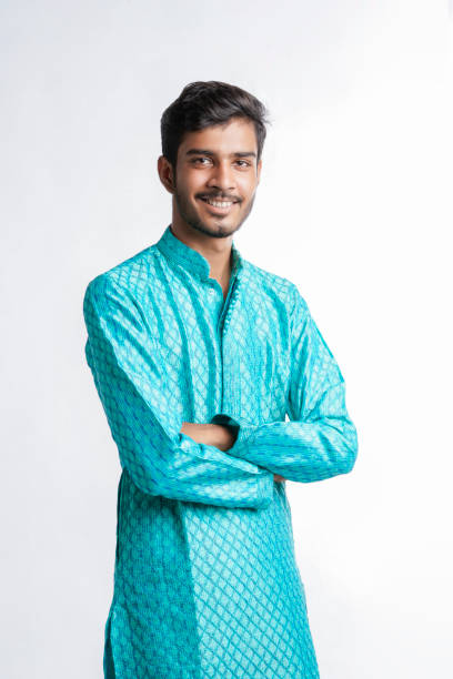 istock Indian man in tradition wear and giving expression on white background. 1388500743