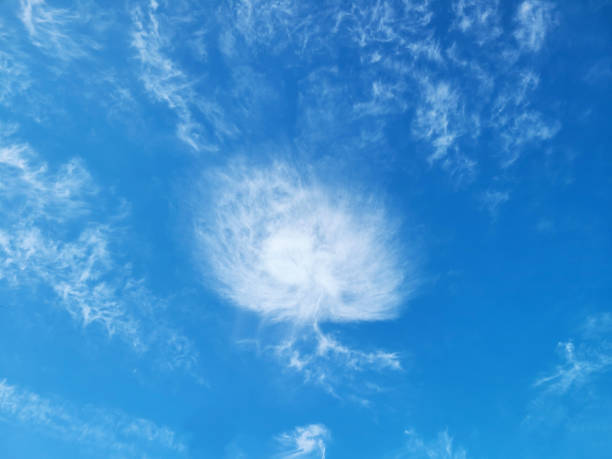 Blue skies and clouds of unusual shapes. stock photo