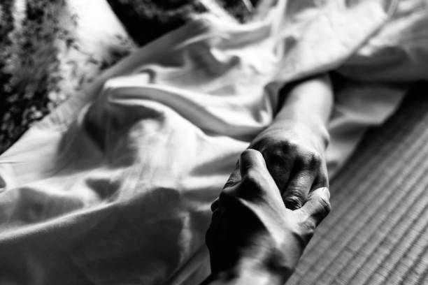 istock Image of reaching out from traditional Japanese bedding 1388505065