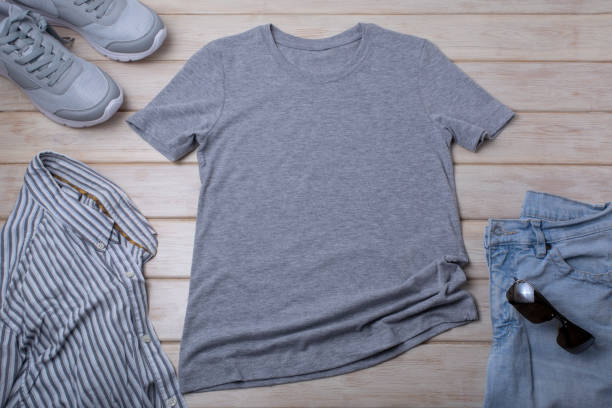 istock Gray T-shirt mockup with sunglasses and blue jeans 1388507724