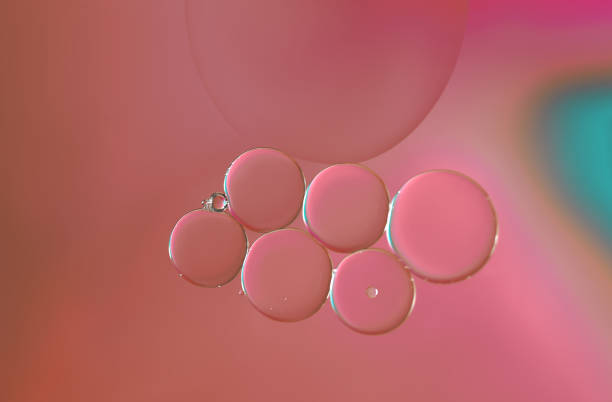 istock Abstract oil drops in water macro image 1388508593