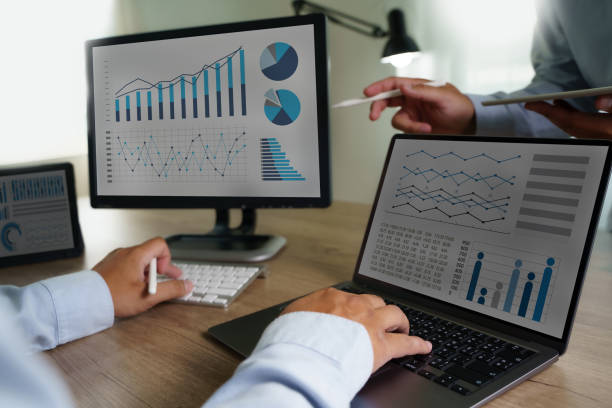 istock analysis  businessman with graphs analysis  technology and financial growth Business Documents 1388508595