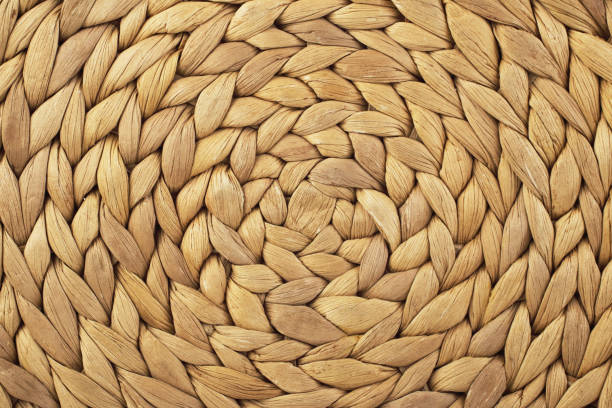 istock Dry banana leaf artwork background with circle structure. Wicker placemat background. Round traditional handmade rattan pattern. 1388509428