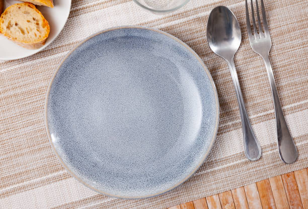 istock Various cutlery on the table - preparation with festive banquet 1388509433