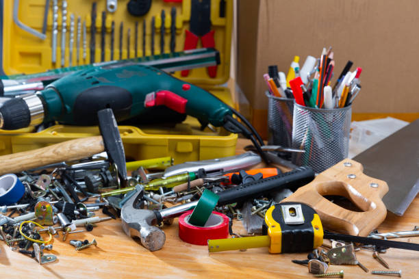 istock Repair tools on wooden background 1388509466