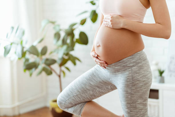 istock Pregnancy yoga and meditation at home 1388512016