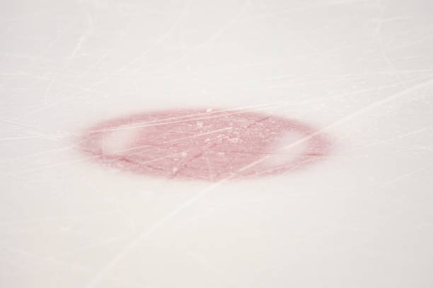 istock Ice hockey rink red face off point details texture. 1388513252