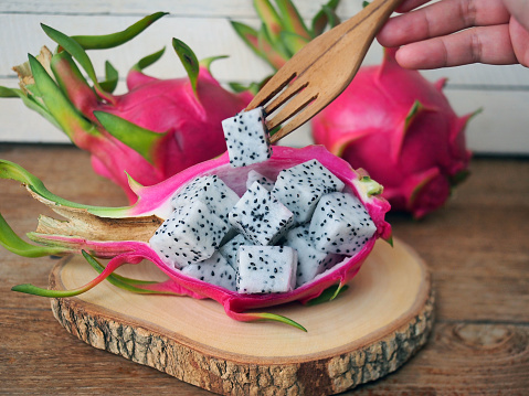 Dragon fruit on rustic wooden table