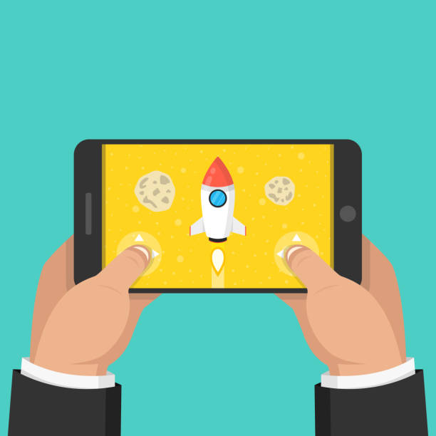 istock Man holding smartphone and playing in rocket game. Mobile gaming concept. Flat cartoon style. Vector illustration. 1388517072