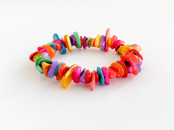 istock Freshwater Shell Chip Bracelet in Vibrant Rainbow Colours Isolated on White 1388518426