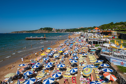 Istanbul, Turkey - June 22, 2013 : Kilyos beach, on the Black Sea coast of Istanbul, is among the places where Istanbulites go to the sea at the weekend.