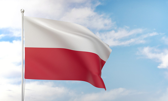 Polish flag waving in the blue sky. Politics and Government Concept.