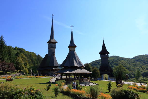 picturesque buildings in romania September 8 2021 - Barsana, Romania: Barsana monastery, one of the main attractions in Maramures in Romania maramureș stock pictures, royalty-free photos & images