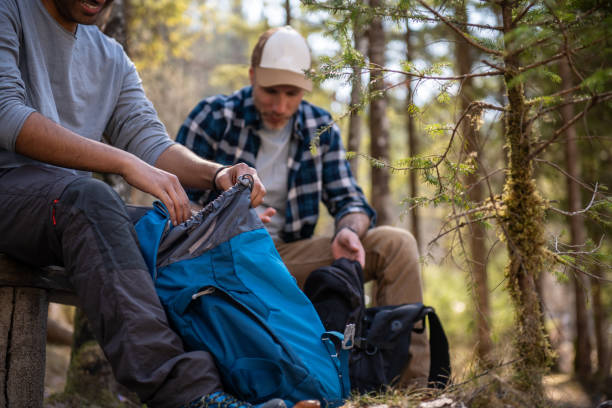 istock Friends taking a break during a hiking in the forest 1388527042