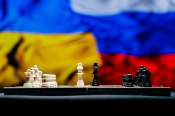istock War between Russia and Ukraine, conceptual image of war using chess board, pieces and national flags on the background. Ukrainian & Russian crisis, political conflict. Stop the war 2022 1388527811