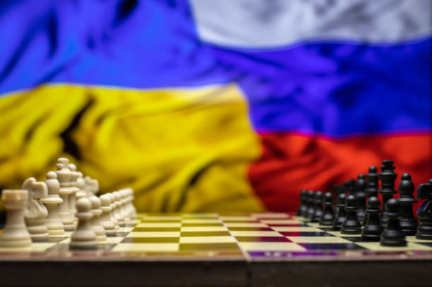 istock War between Russia and Ukraine, conceptual image of war using chess board, pieces and national flags on the background. Ukrainian & Russian crisis, political conflict. Stop the war 2022 1388527964