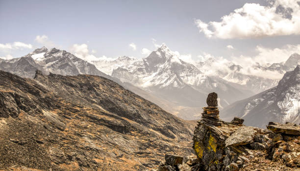 istock Scenic view of stacked rocks on mountain ridge 1388530973