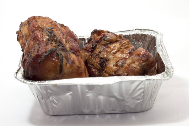 roast grilled beef with aluminum tub and chips