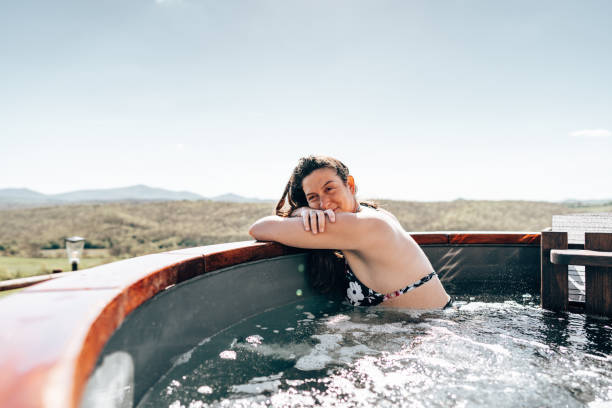 istock woman resting in an hot tub 1388533653