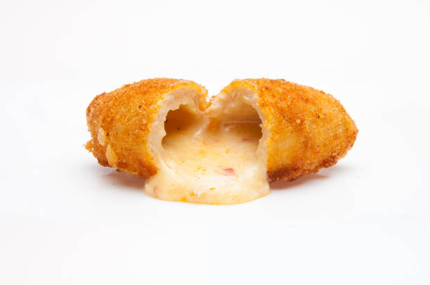 istock Chicken ala Kiev small with cheese and diced vegetables. Isolated on a white background. 1388535425