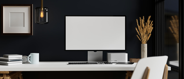 Elegance black office workspace interior with modern computer mockup, stuff and decor on white table, white chair and frame mockup on black wall. 3d rendering, 3d illustration