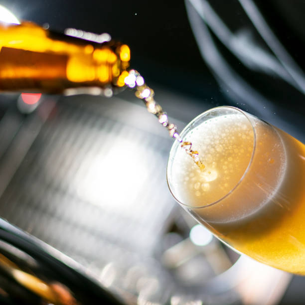 istock bartender pouring beer to the glass 1388539709