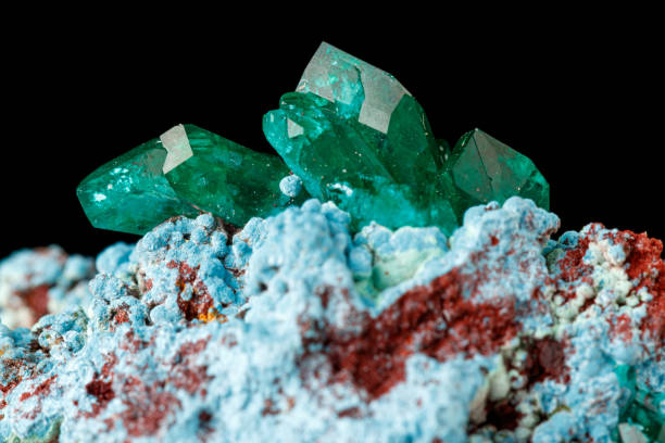 istock macro mineral stone Dioptase on a black background 1388541378