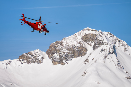 Helicopter with camera mounted on blue sky