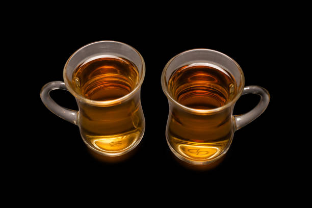 istock A turkish glass of tea on black background. 1388547218