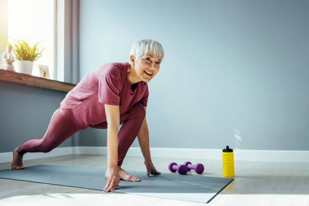 istock Fit woman exercising at home doing lunges exercise. 1388547733