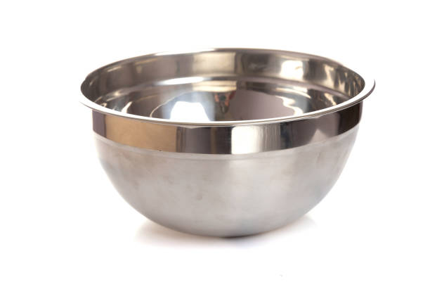 metal chrome polished salad bowl empty on white isolated background.