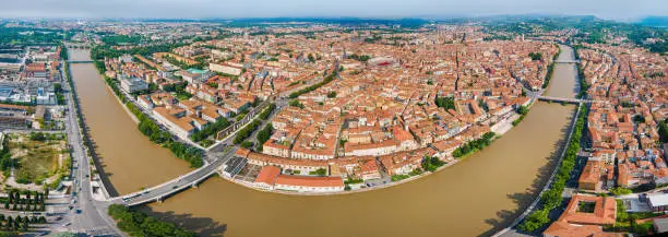 Photo of beautiful view on Verona city in Italy on the sunset. Verona is famous city of love in the north of Italy.