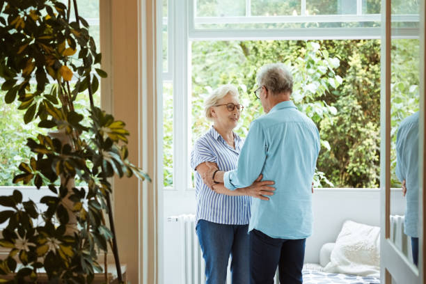 istock Affectionate senior couple at home 1388558988