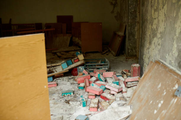 Broken, destroyd, abandoned kindergarten in Chernobyl Exclusion Zone, Lost toys, A broken plastic doll, Ukraine, ghost town Pripyat.