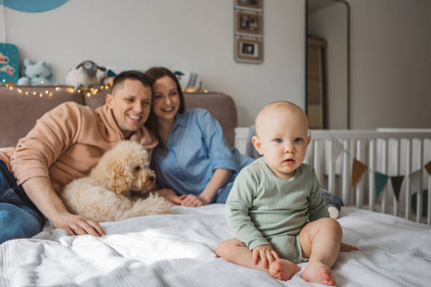 istock Young family at home 1388564435