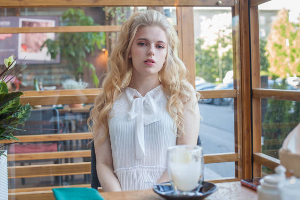 istock Young Businesswoman having a coffee break. 1388564867