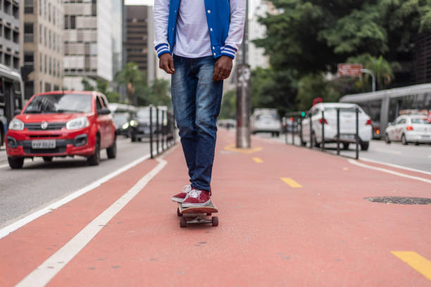 istock Student skateboarding in the city 1388568233