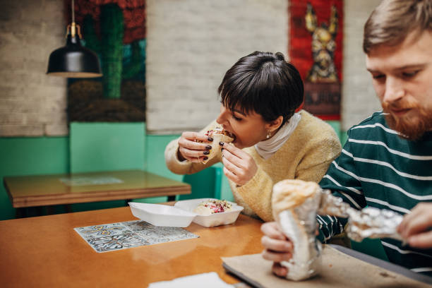 istock Couple in fast food restaurant 1388568260