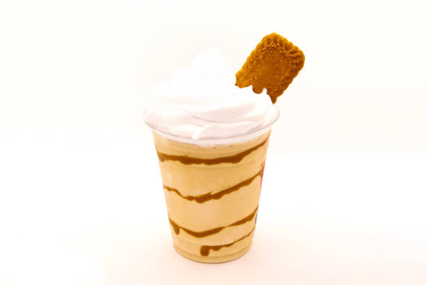 istock Flavoured milk shake with biscuit in a disposable plastic cup 1388569885