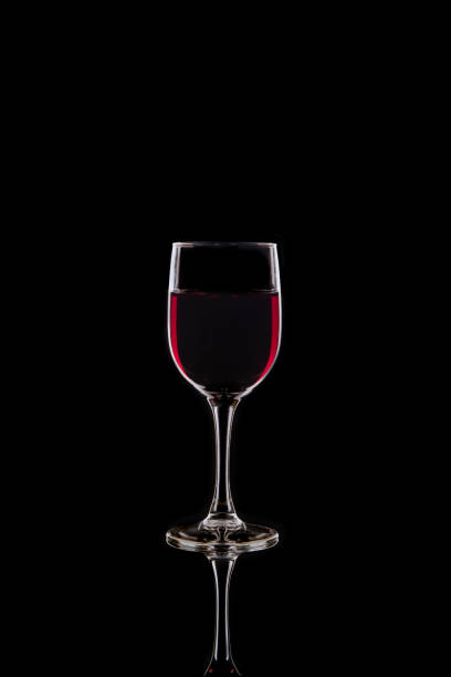 istock Glass of Red wine in  silhouette 1388570189