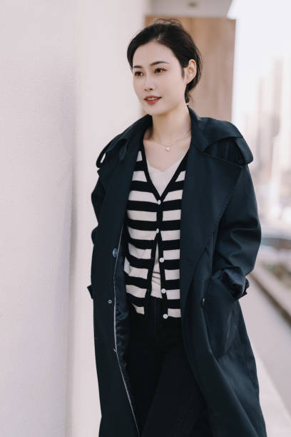 istock Asian beauty is looking at her mobile phone 1388575960