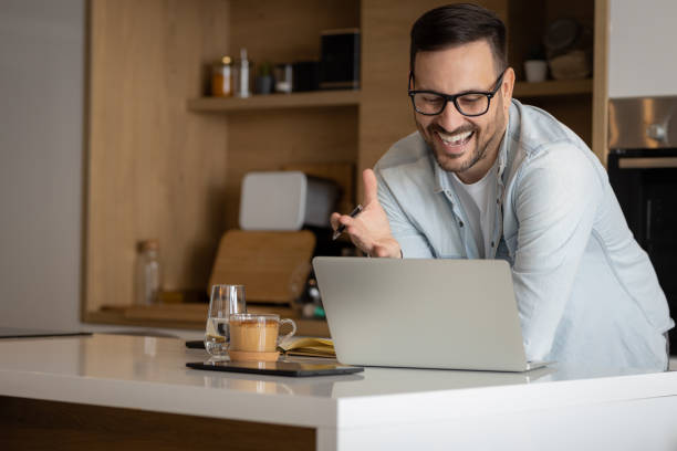 istock Young businessman in kitchen 1388592300