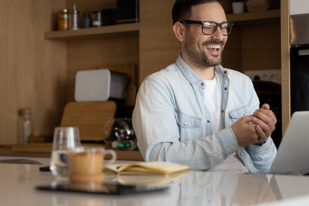 istock Young businessman in kitchen 1388593509
