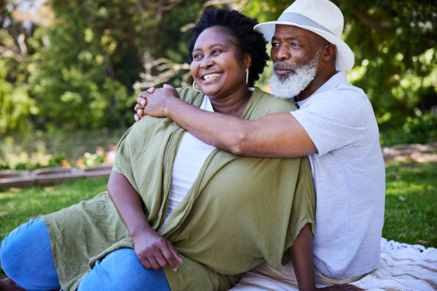 istock Loving mature couple looking at the view during a picnic 1388594538