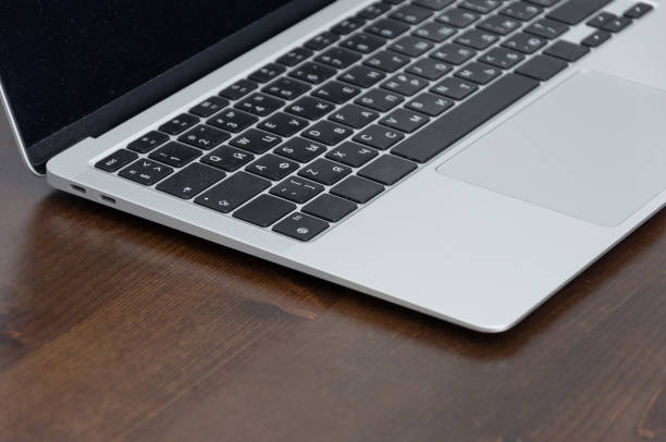 istock laptop on brown table close-up keyboard 1388595765