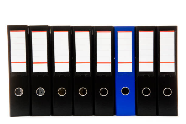 istock row of folders for papers and documentation on a shelf in the office 1388598122