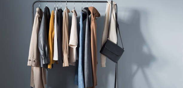 istock basic women's autumn wardrobe with shoes and handbags on  hanger 1388598249